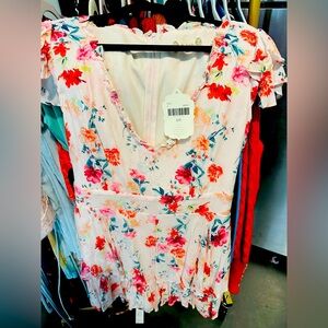 Shorts romper. Super cute on. Never worn.